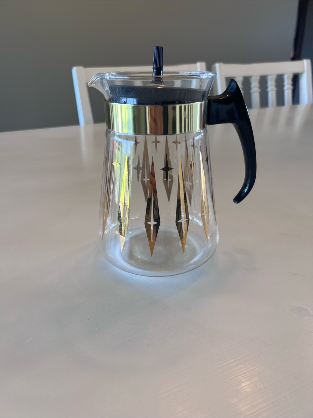 Pyrex Clear Glass Coffee Carafe with Gold Starburst Pattern and Black Handle